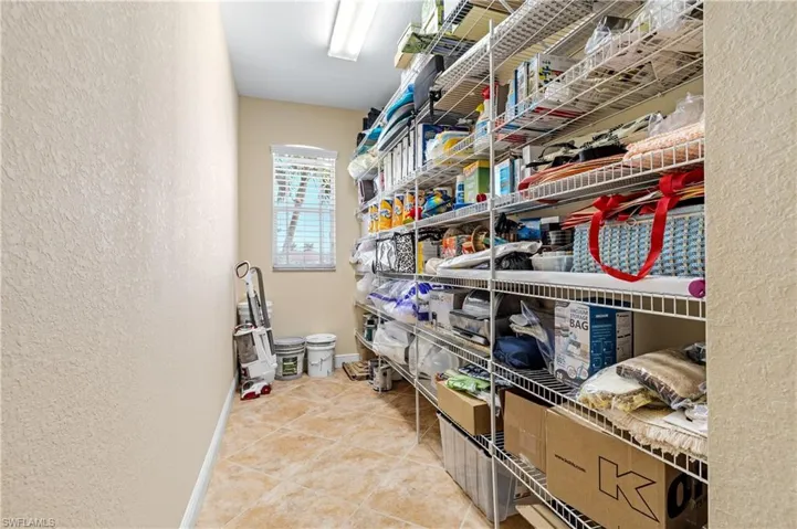 This AMAZING room is huge and has A/C! with access from garage and interior!