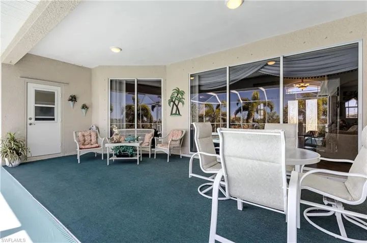 Screened lanai and under truss! Plenty of entertaining space!