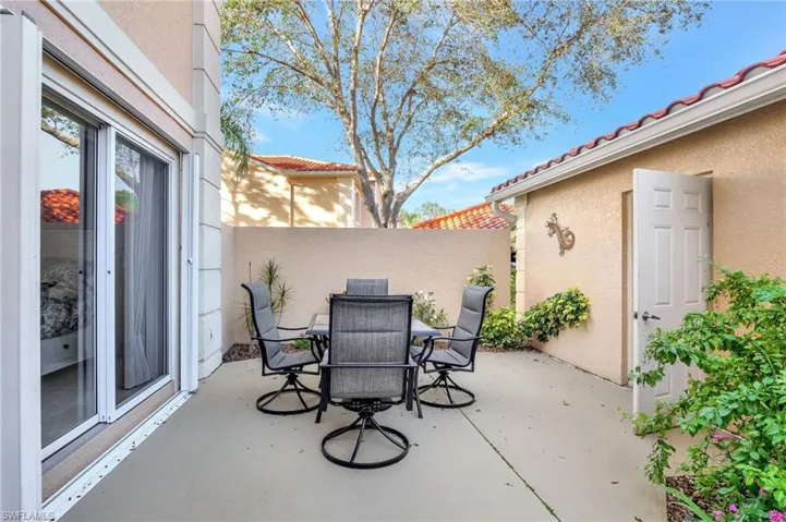 View of patio / terrace featuring outdoor dining space and fence