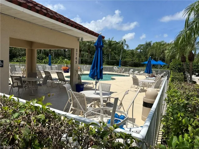 View of patio / terrace featuring a community pool