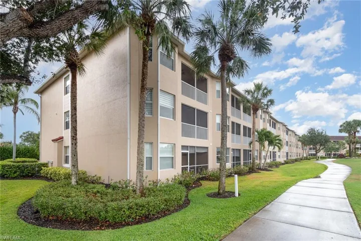 View of building exterior with a residential view