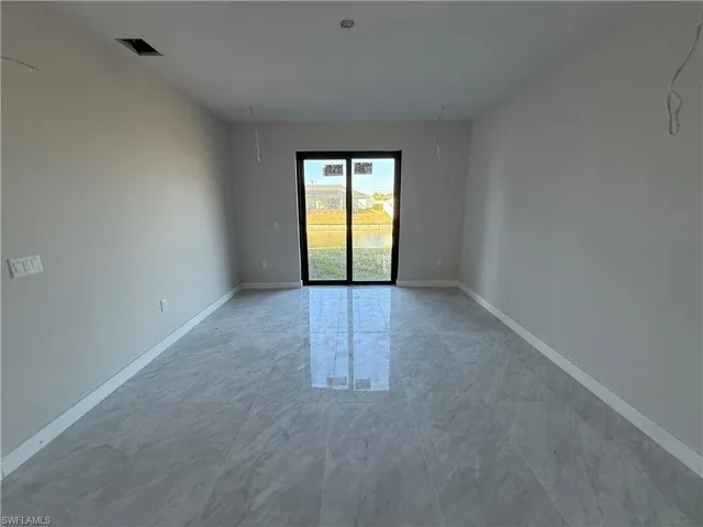 Spare room with baseboards