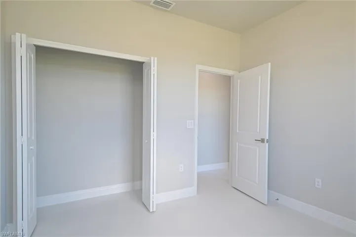 908 Champion AVE, LEHIGH ACRES FL 33971