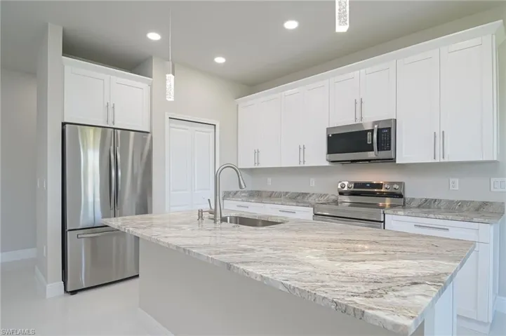 908 Champion AVE, LEHIGH ACRES FL 33971