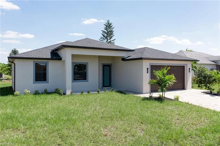 908 Champion AVE, LEHIGH ACRES FL 33971