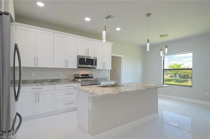 908 Champion AVE, LEHIGH ACRES FL 33971