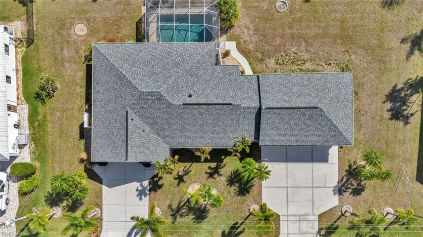 View from above of property with a pool area