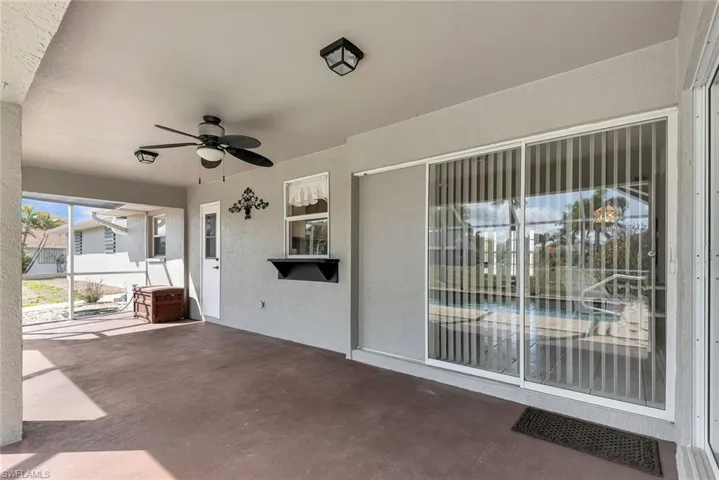 View of patio featuring a ceiling fan