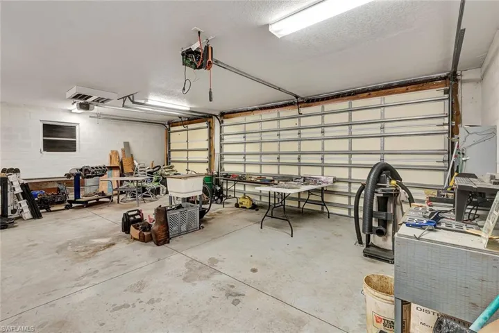 Garage featuring a workshop area