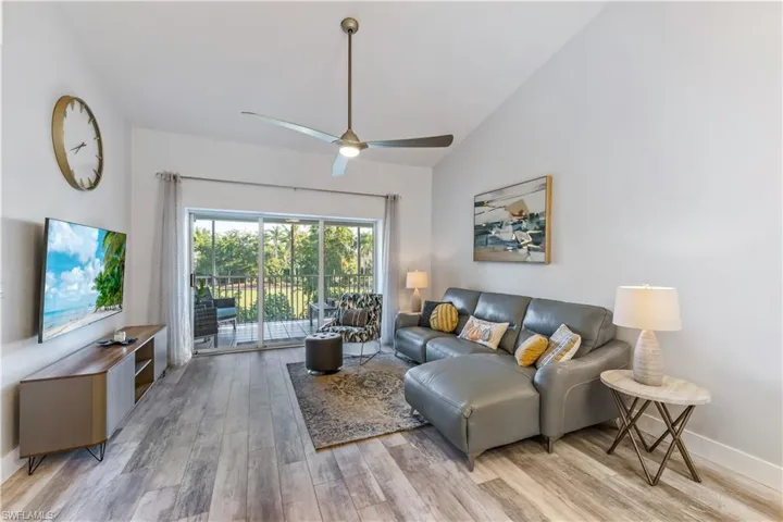 Living room looking towards large screened lanai