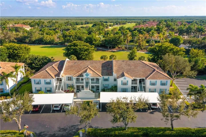 Front of building with view of the golf course