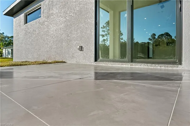 Patio area featuring large format concrete pavers