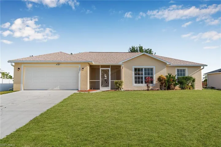 Single story home with a front yard, a shingled roof, a garage, concrete driveway, and stucco siding