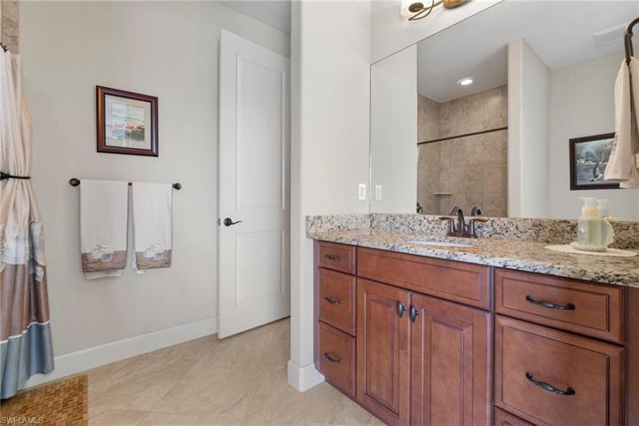 Spacious guest bathroom with easy access to the pool and beautiful outdoor area!