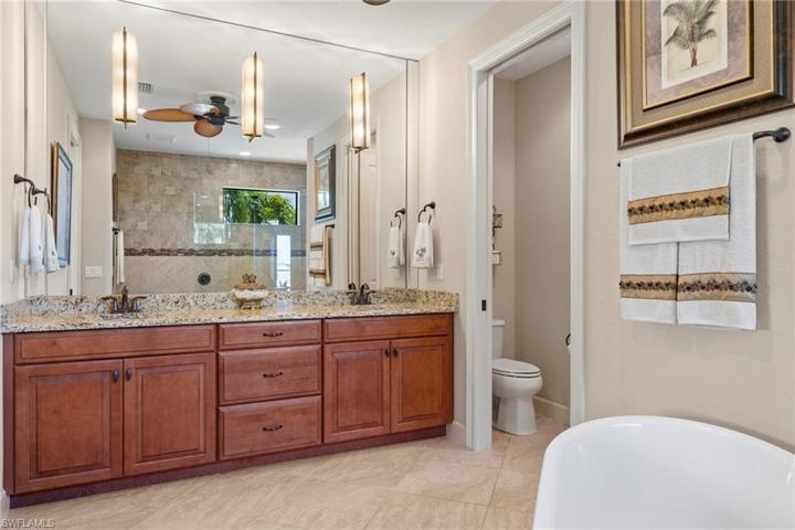Spa like master bath - soaking tub, custom mirrors with hardwired lighting, plenty of space for storage!