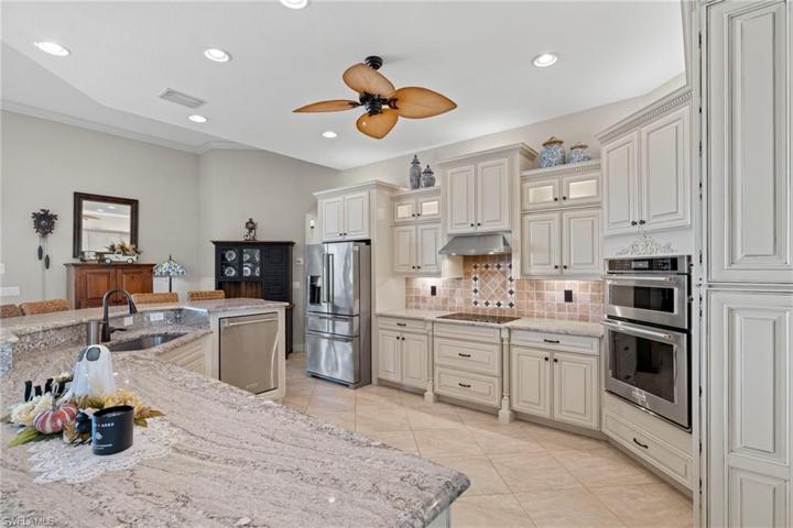 Wall to wall cabinets, upgraded appliances and tons of counter space!