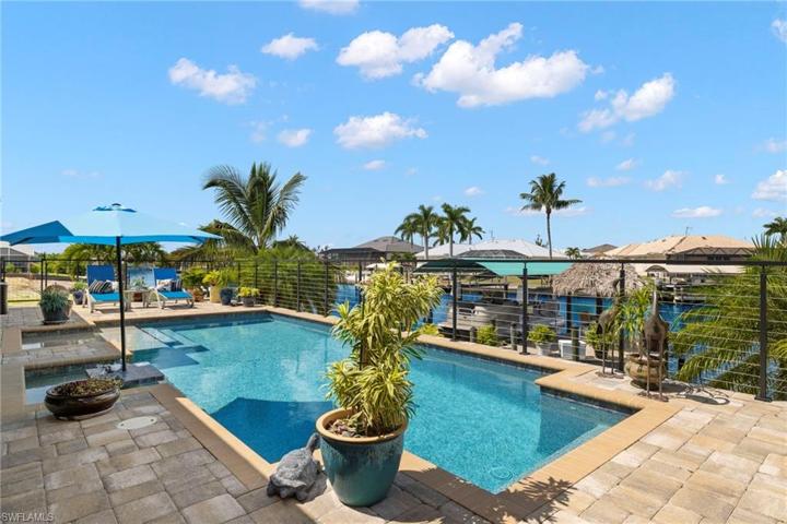 The ultimate pool - sparklling, oversized and great sun exposure!  Architectural fence adds one more design element to this oasis!
