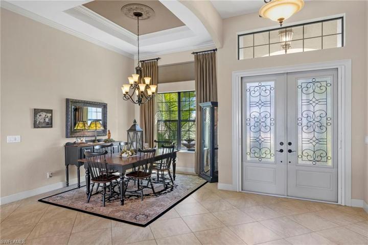 The dining area is another statement room of the home - beautiful ceiling details, chandelier and a showcase large wall for your art display or large dining buffet.