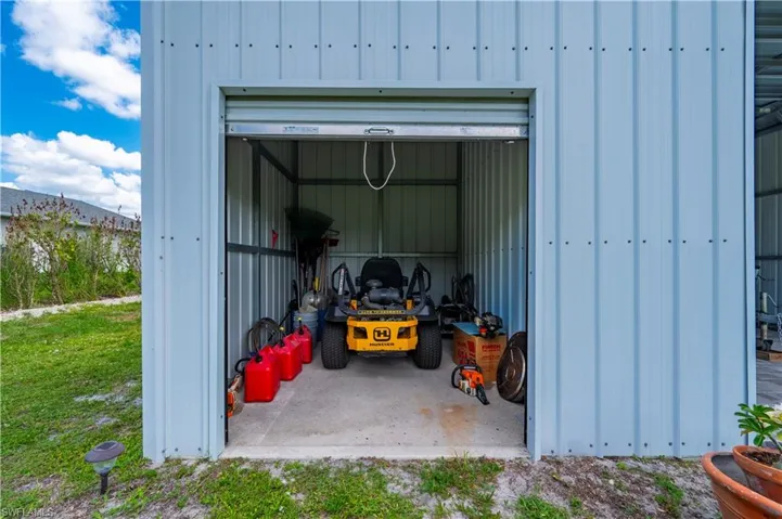 Separate storage for lawn equipment. Lawn equipment is negotiable.