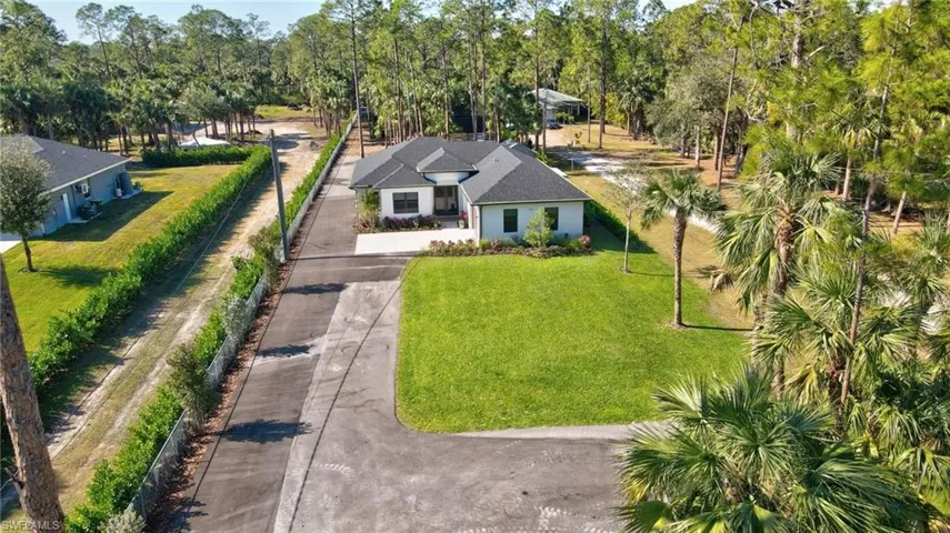 View of front of property with a front yard