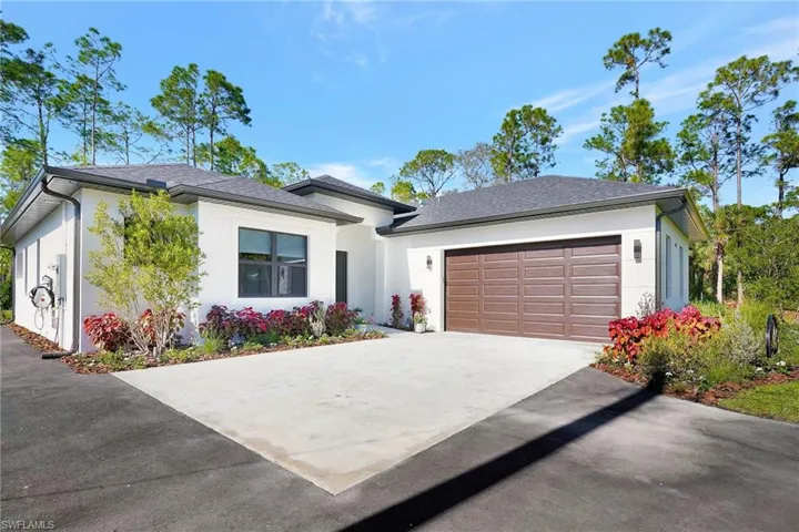 View of front of home with a garage