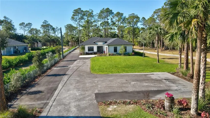 View of front of house featuring a front lawn