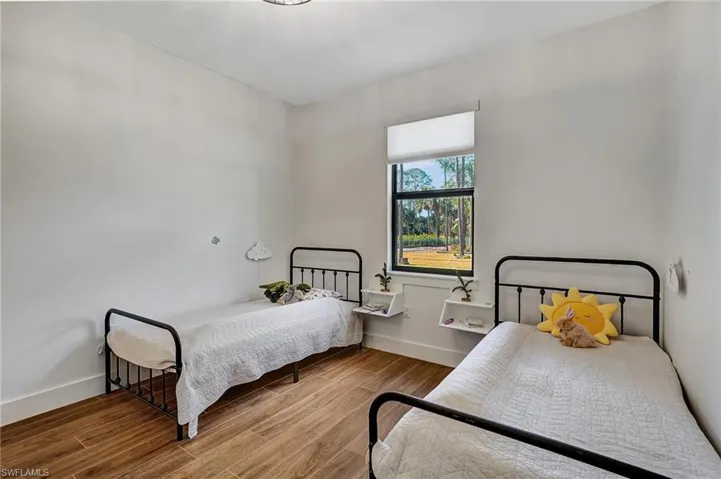 Bedroom featuring hardwood / wood-style floors