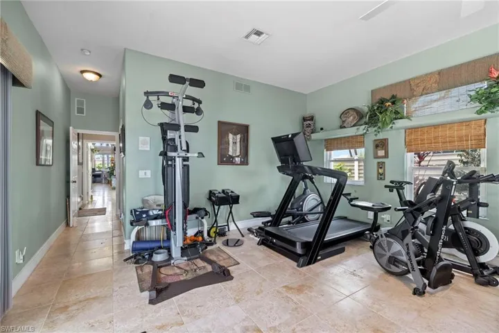 View of workout area plumbed for kitchen or mini-bar