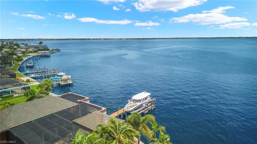 Water view featuring a dock