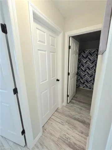 Hall to both bedrooms and guest bathroom off Living Room