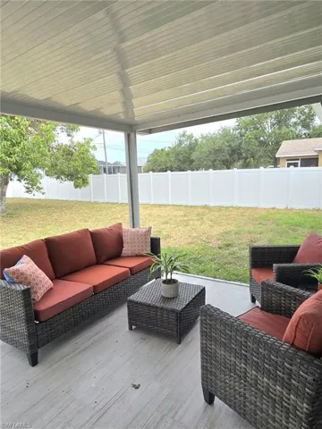 Wood like tile deck with outdoor lounge area