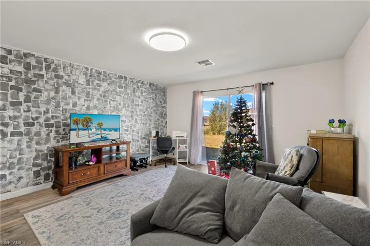 Living room featuring light hardwood / wood-style floors