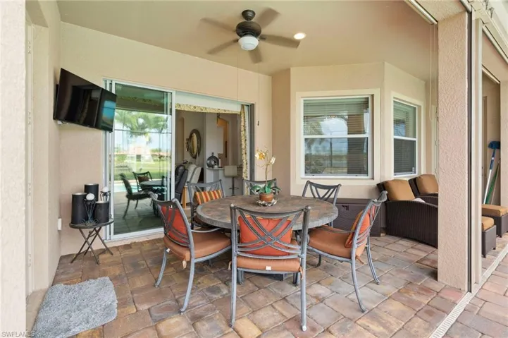 View of patio / terrace with outdoor dining space and ceiling fan