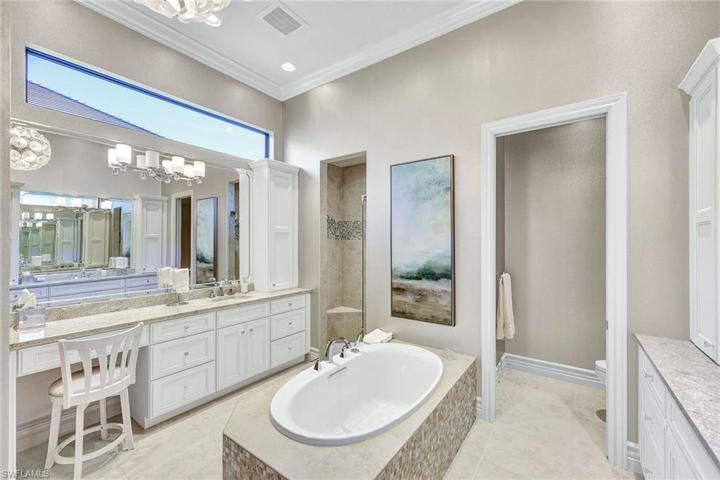 The Primary bath offers both a soaking tub and a shower with multiple heads