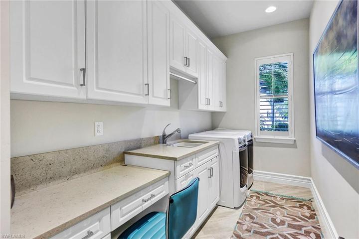 Laundry with Sink, Desk and Generous Storage