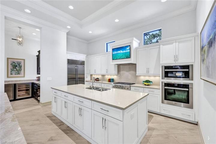 Gourmet Sub-zero, Thermador and Miele appliances, warming drawer, spice drawer and kitchen garage
