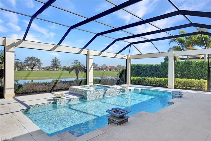 New pool tile, and natural stone pool deck is gentle on your feet