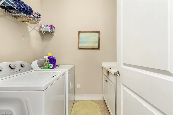 Laundry inside home with vanity/sink
