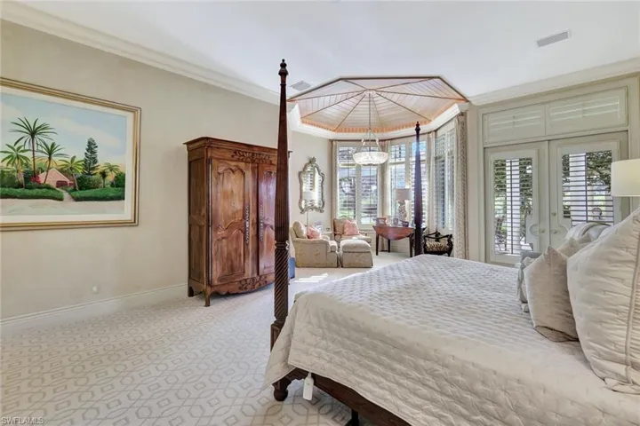 Primary Bedroom with Seating area and Private Lanai