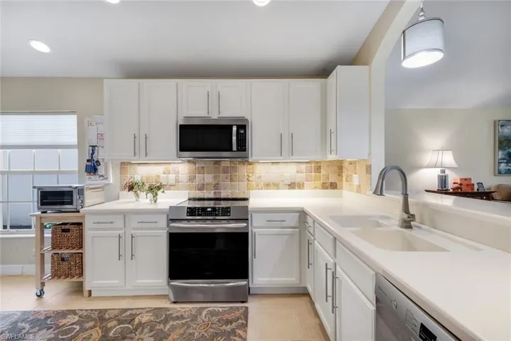 bright kitchen with all newer appliances
