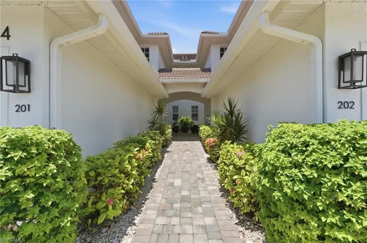 Beautifully landscaped walkway maintained by the association.