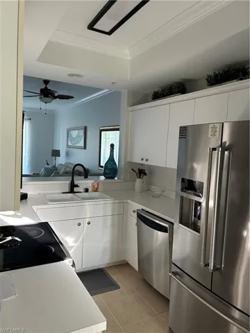 Kitchen white cabinets, new refrigerator 2023