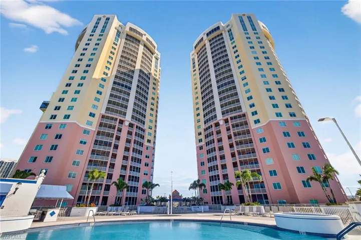 Community pool featuring a patio