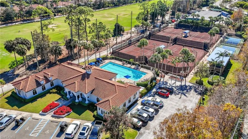 Aerial view of recreation clubhouse with exercise room and access to community pool, tennis, and pickleball