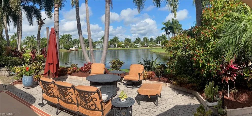 View of patio with a water view