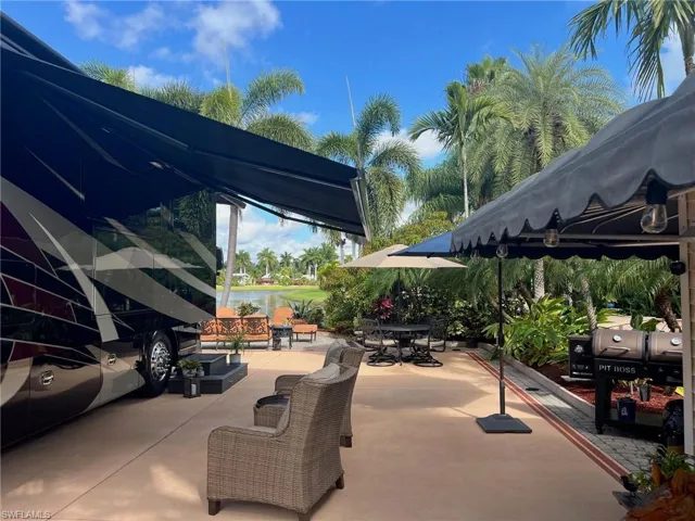 View of patio / terrace with a water view