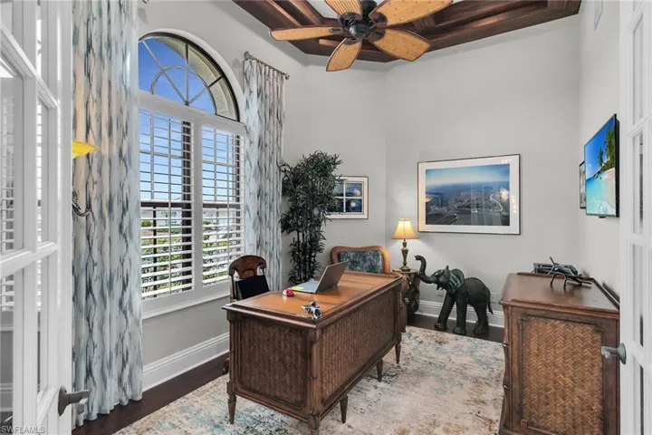 Office featuring a ceiling fan and healthy amount of natural light