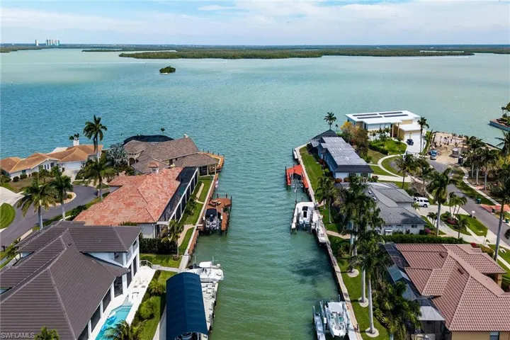 Aerial view of residential area with a nearby body of water