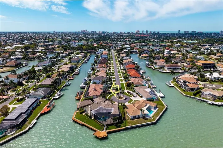 View of urban area featuring a large body of water and nearby suburban area