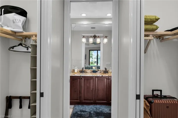 Full bath featuring double vanity and recessed lighting
